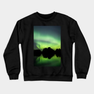 Northern lights glowing over lake in Finland Crewneck Sweatshirt